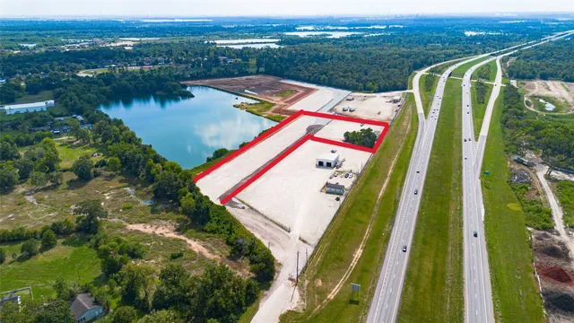 a view of swimming pool with a yard and mountain view