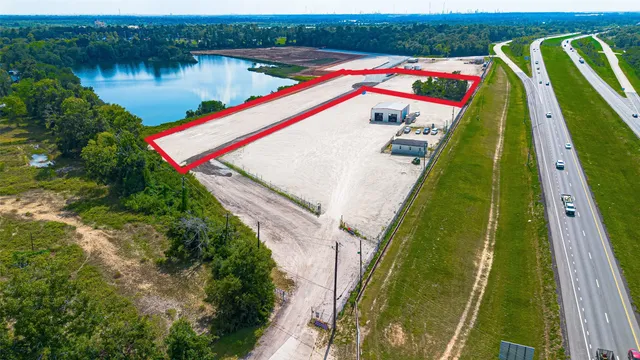 a view of swimming pool with a yard