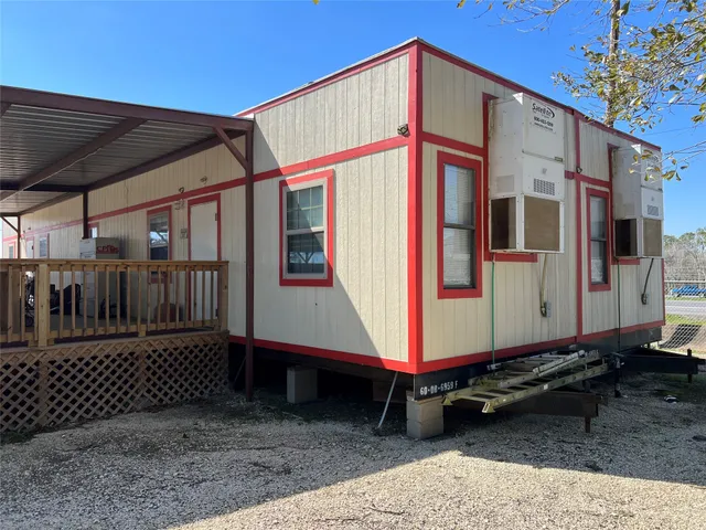a house with a black white door