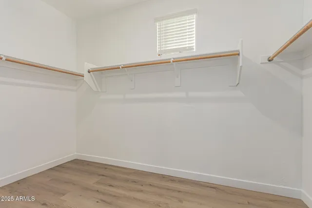 a view of an empty walk in closet