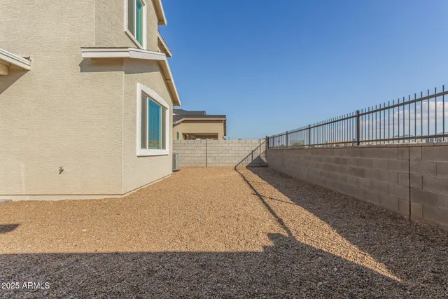 a view of a swimming pool and an empty space