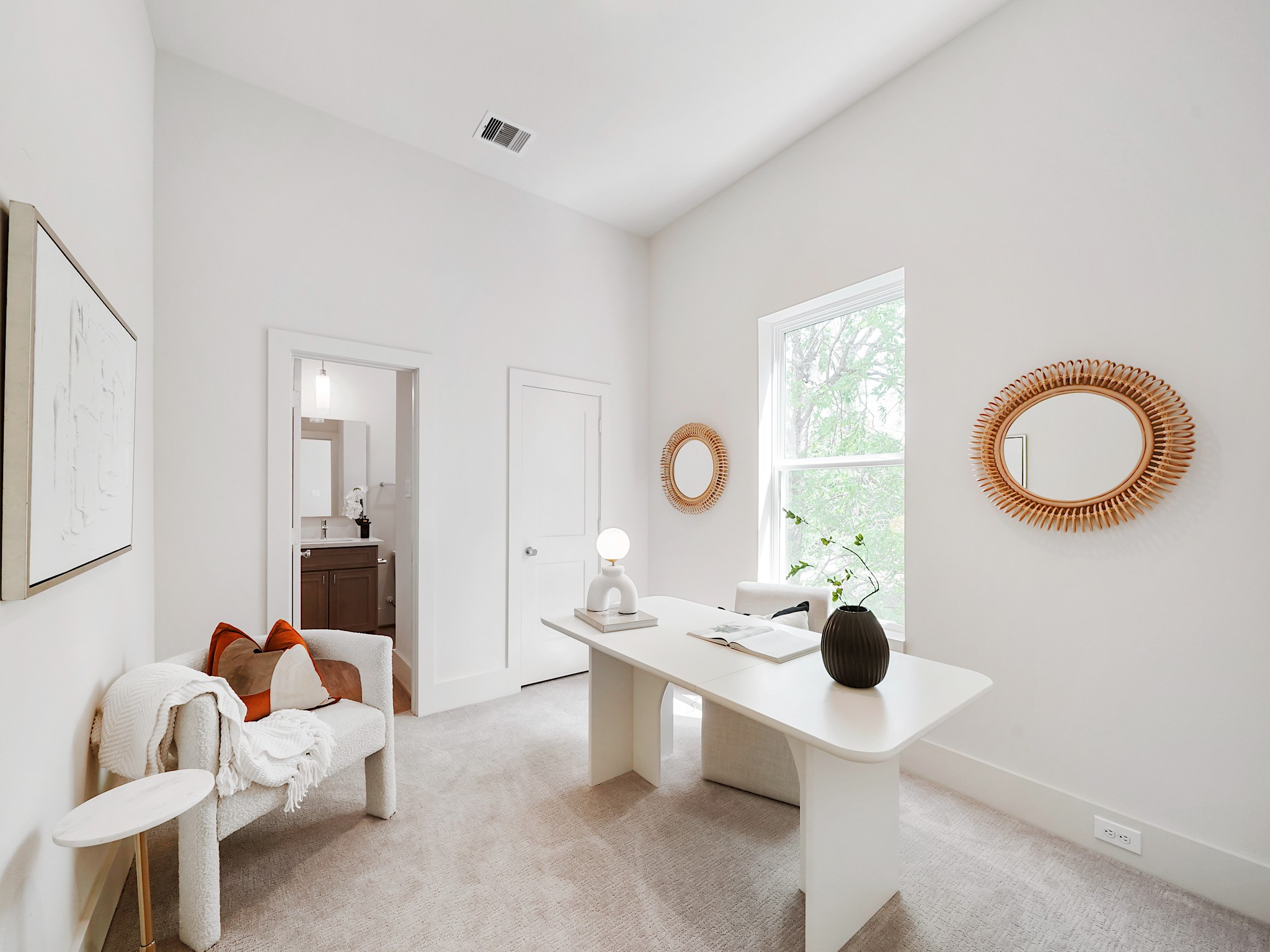 861 Rachel Street, Unit E Houston, TX 77091 - Photo 21 of 29 This inviting third bedroom, currently styled as a bright, airy office, offers versatility and potential for your ideal living space.