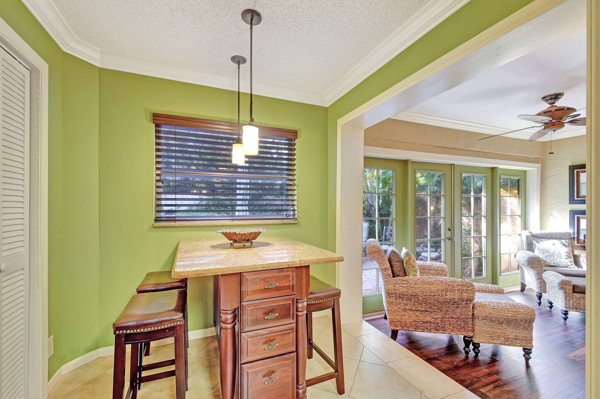 318 Southeast 7th Avenue, Unit 3 Delray Beach, FL 33483 - Photo 14 of 44 a dining room with furniture and a window