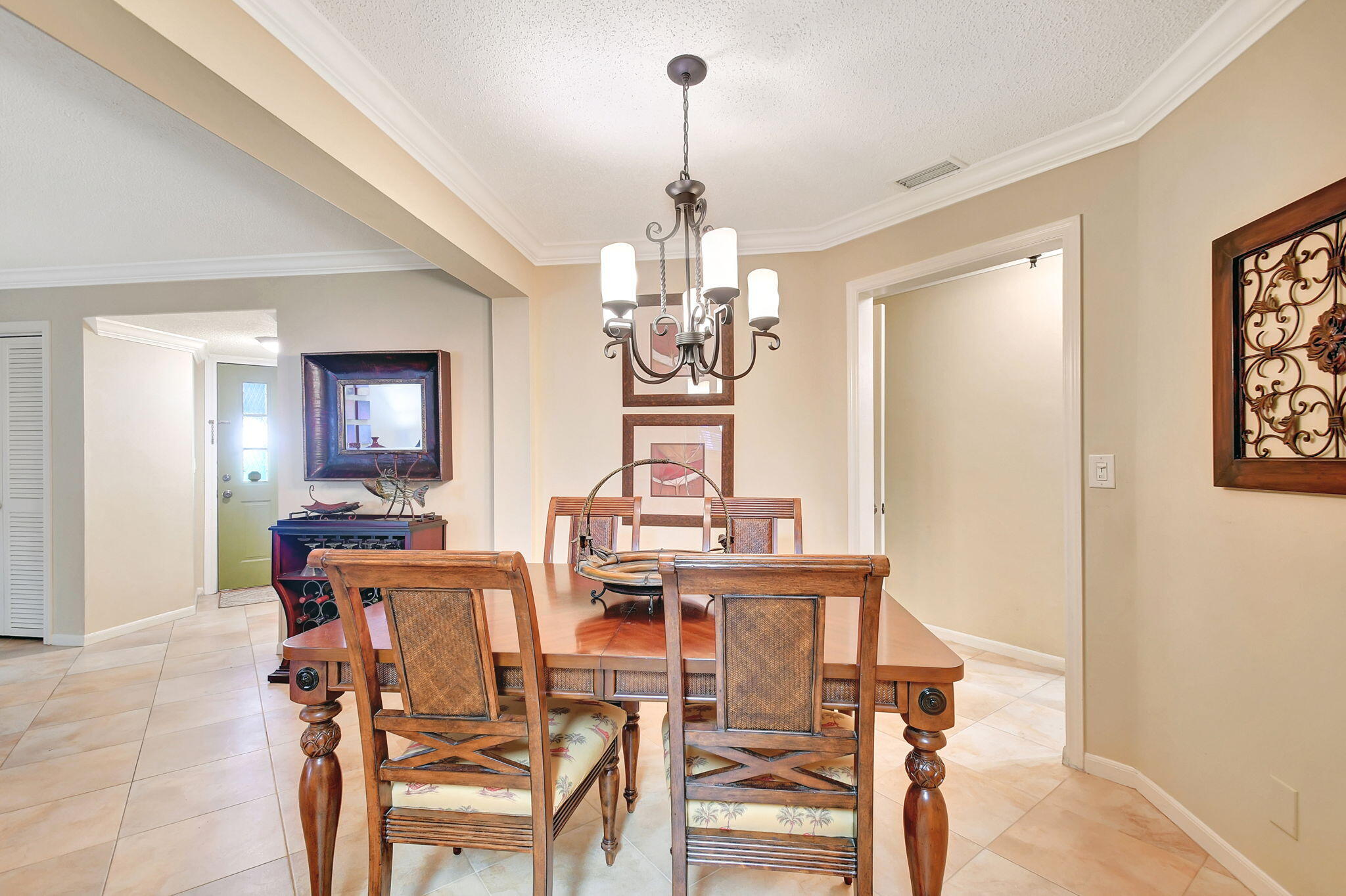 318 Southeast 7th Avenue, Unit 3 Delray Beach, FL 33483 - Photo 19 of 44 a view of a dining room with furniture window and wooden floor