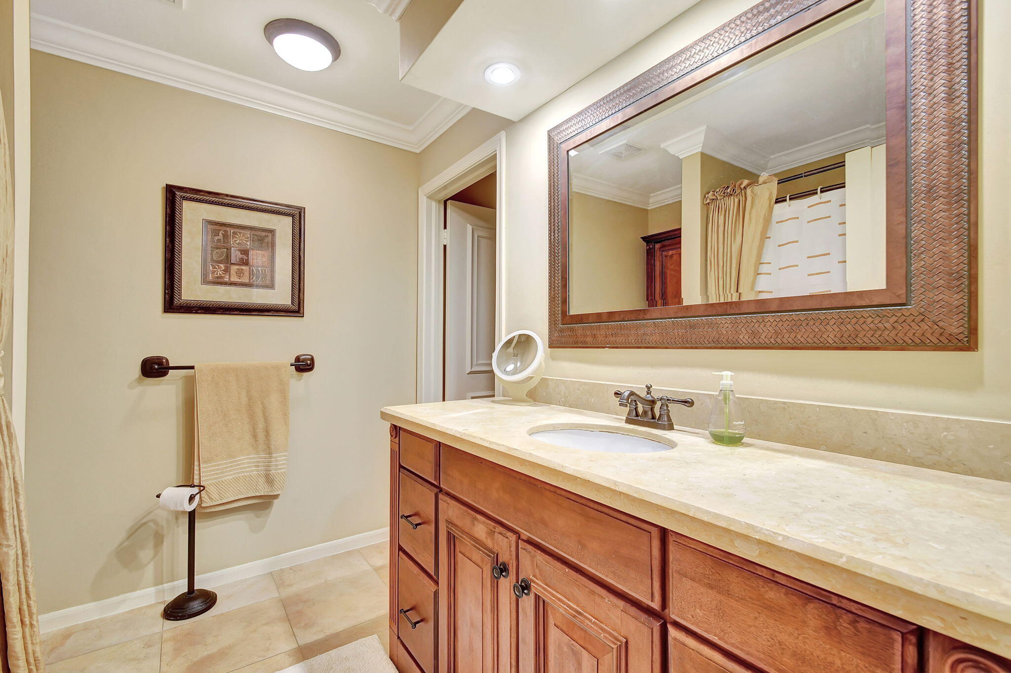318 Southeast 7th Avenue, Unit 3 Delray Beach, FL 33483 - Photo 24 of 44 a bathroom with a sink and a mirror