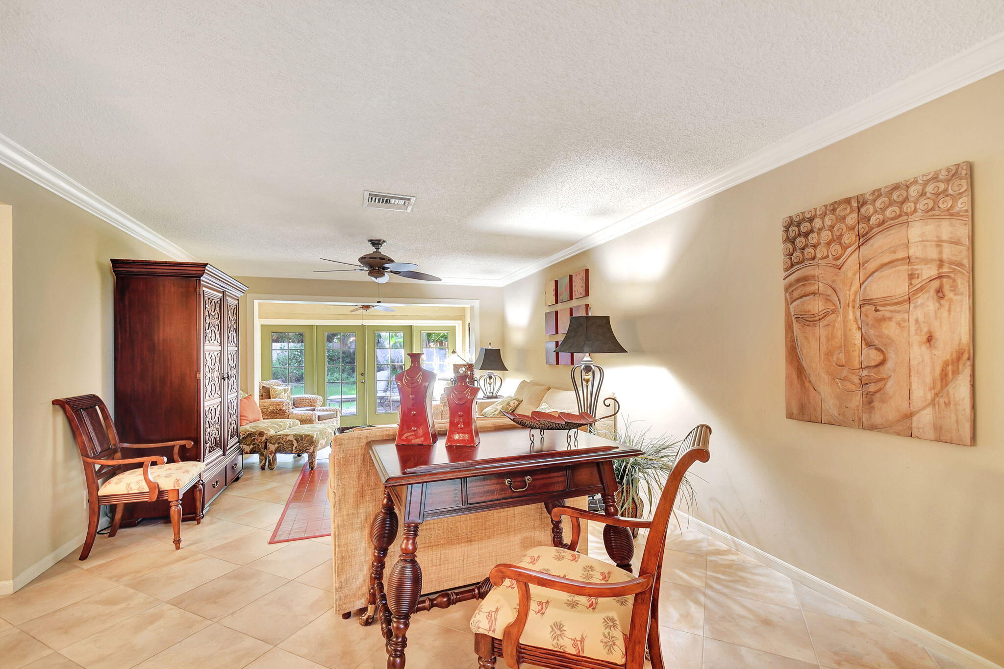 318 Southeast 7th Avenue, Unit 3 Delray Beach, FL 33483 - Photo 7 of 44 a view of a dining room with furniture window and outside view