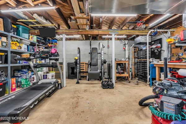 a view of a storage room with clothes