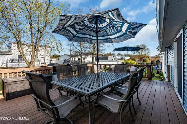 a view of a chairs and table in the terrace