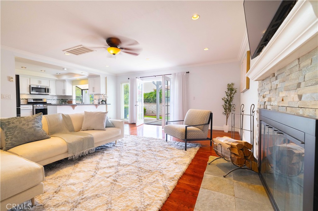 4759 Cll Estrada La Verne, CA 91750 - Photo 13 of 36 a living room with furniture and a fireplace