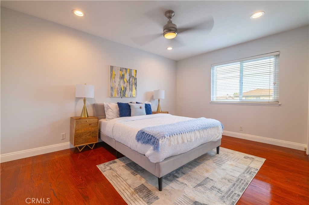 4759 Cll Estrada La Verne, CA 91750 - Photo 23 of 36 a bedroom with a bed and a chandelier