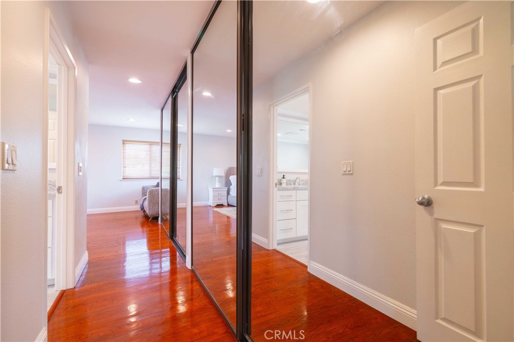 4759 Cll Estrada La Verne, CA 91750 - Photo 28 of 36 a view of a hallway with wooden floor