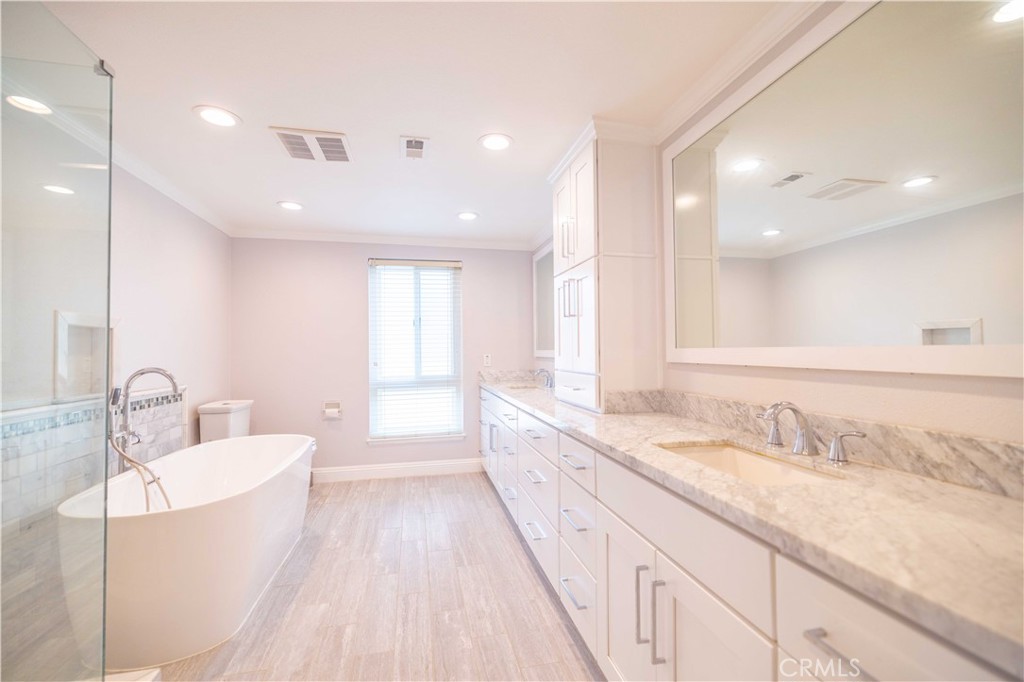 4759 Cll Estrada La Verne, CA 91750 - Photo 29 of 36 a large spacious bathroom with a granite countertop sink mirror and bathtub