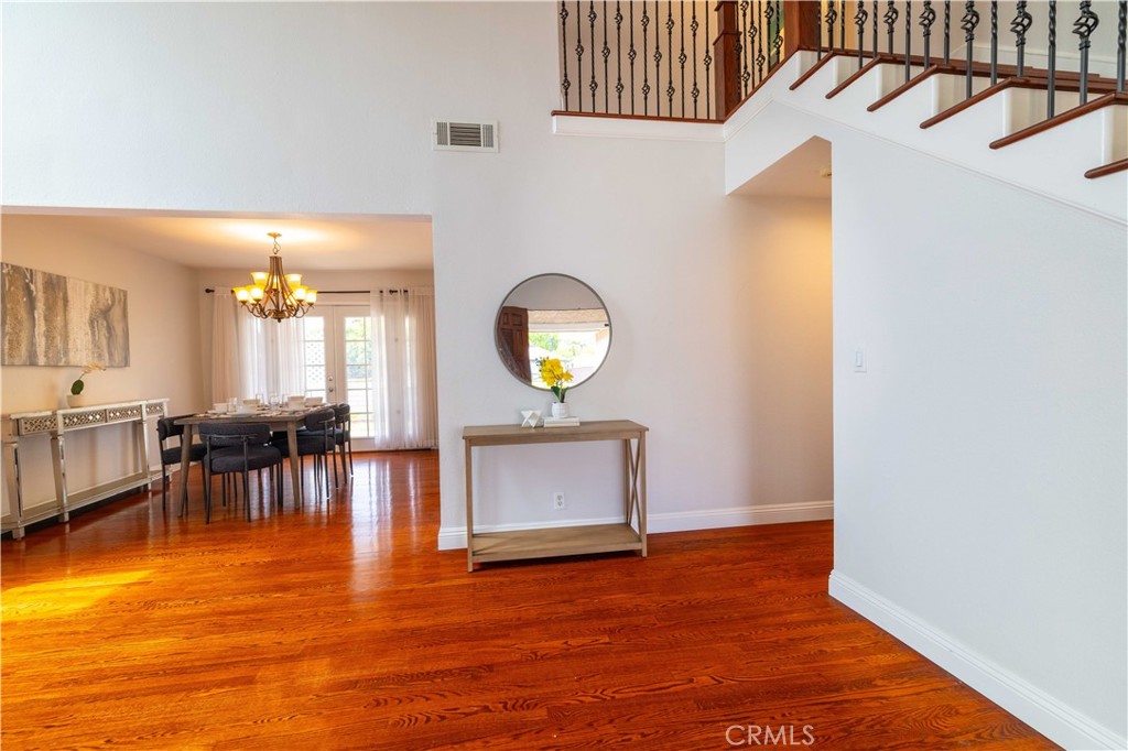 4759 Cll Estrada La Verne, CA 91750 - Photo 8 of 36 a view of a livingroom with furniture and a floor to ceiling window