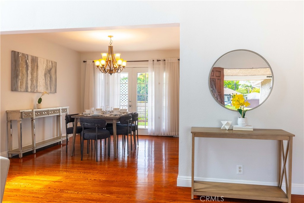 4759 Cll Estrada La Verne, CA 91750 - Photo 10 of 36 a view of a dining room with furniture and a chandelier