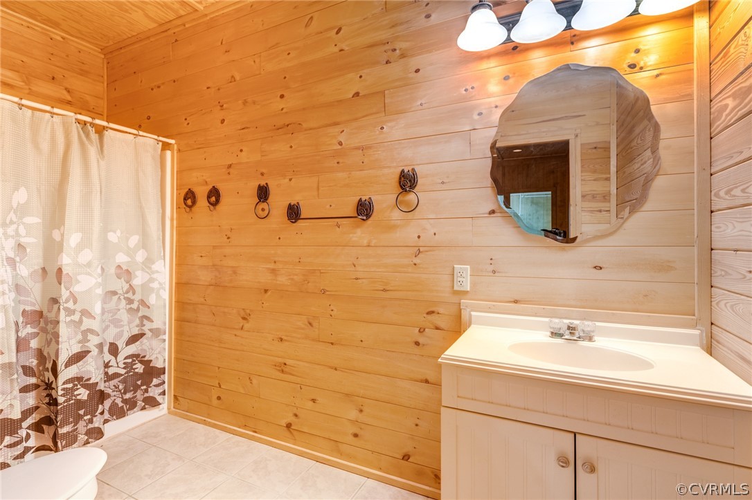 1308 Namozine Road Crewe, VA 23930 - Photo 17 of 32 a bathroom with a sink and a mirror