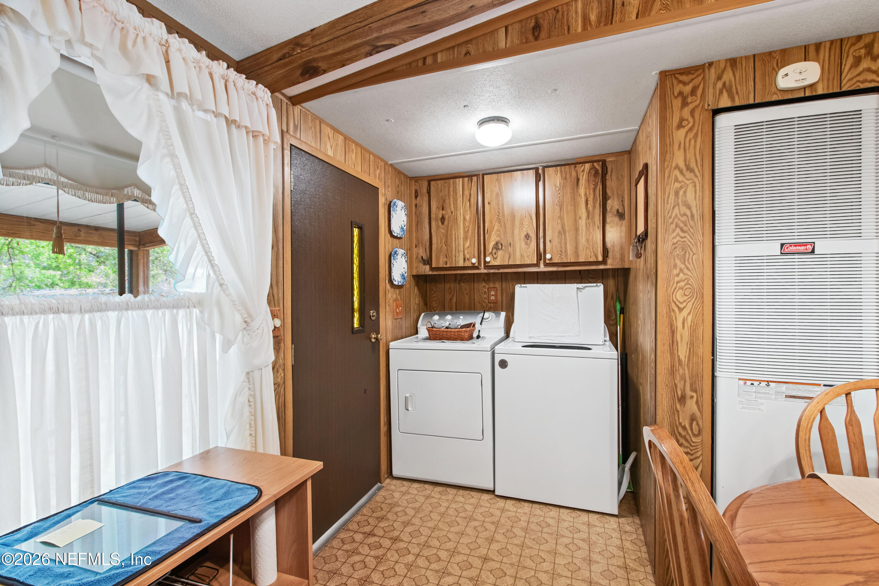 206 Anthony Avenue Interlachen, FL 32148 - Photo 24 of 32 a room with storage and utility