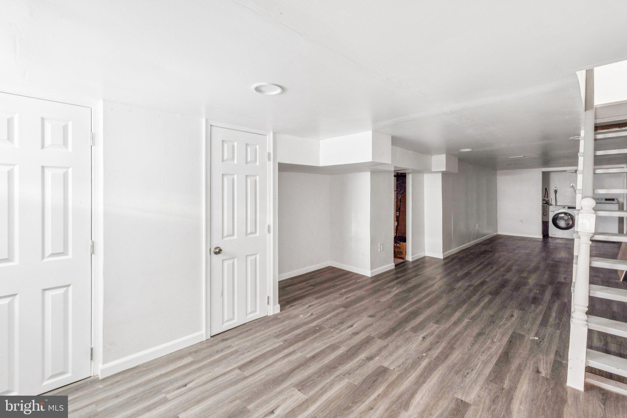1632 North Dover Street Philadelphia, PA 19121 - Photo 18 of 23 a view of an empty room with wooden floor