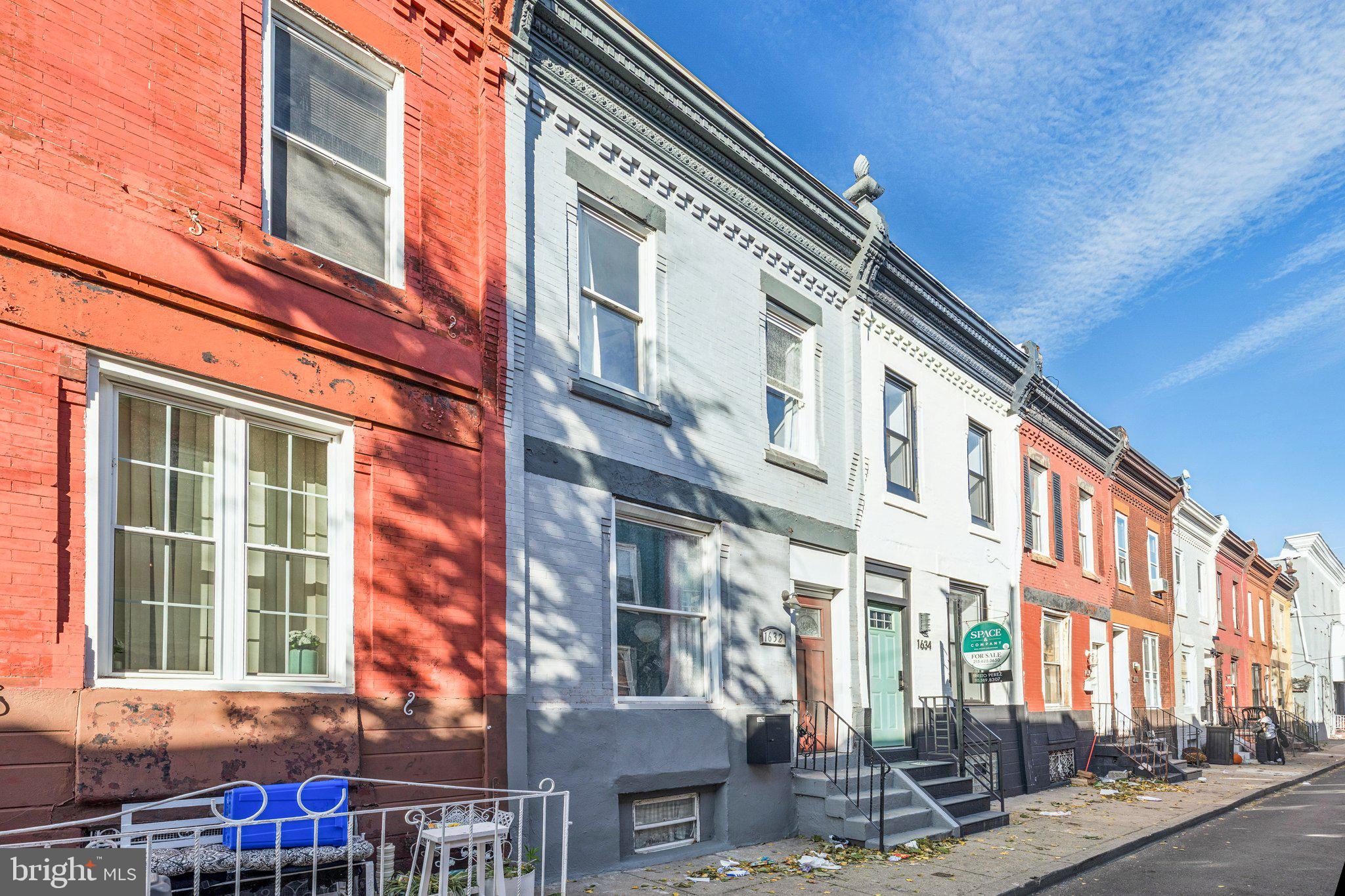 1632 North Dover Street Philadelphia, PA 19121 - Photo 22 of 23 a front view of a multi story building