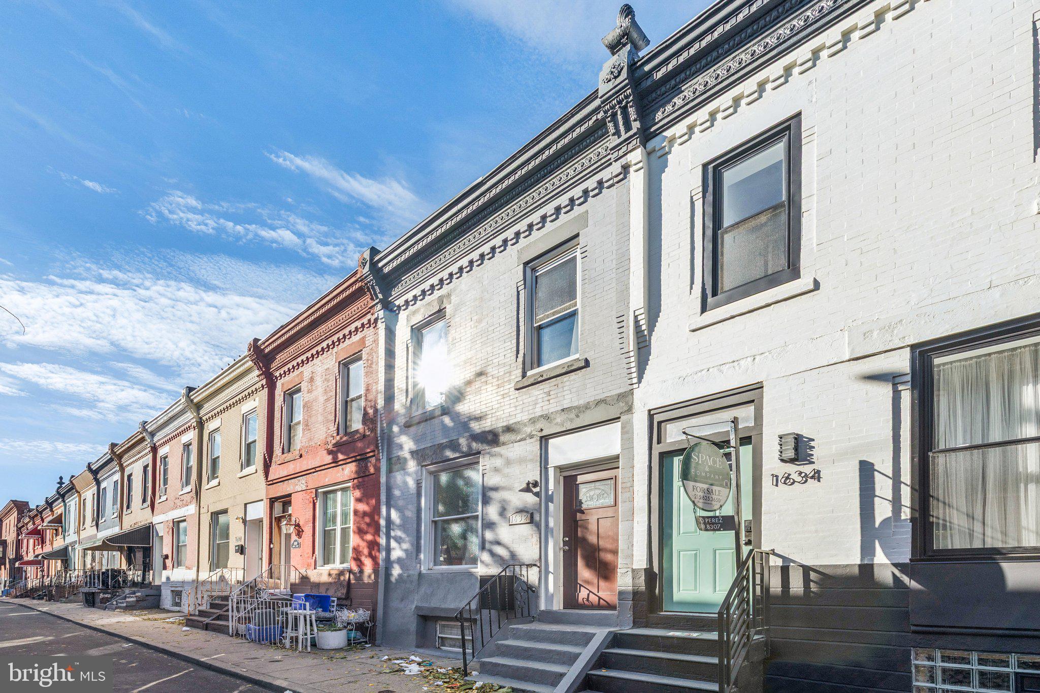 1632 North Dover Street Philadelphia, PA 19121 - Photo 23 of 23 a front view of a multi story building