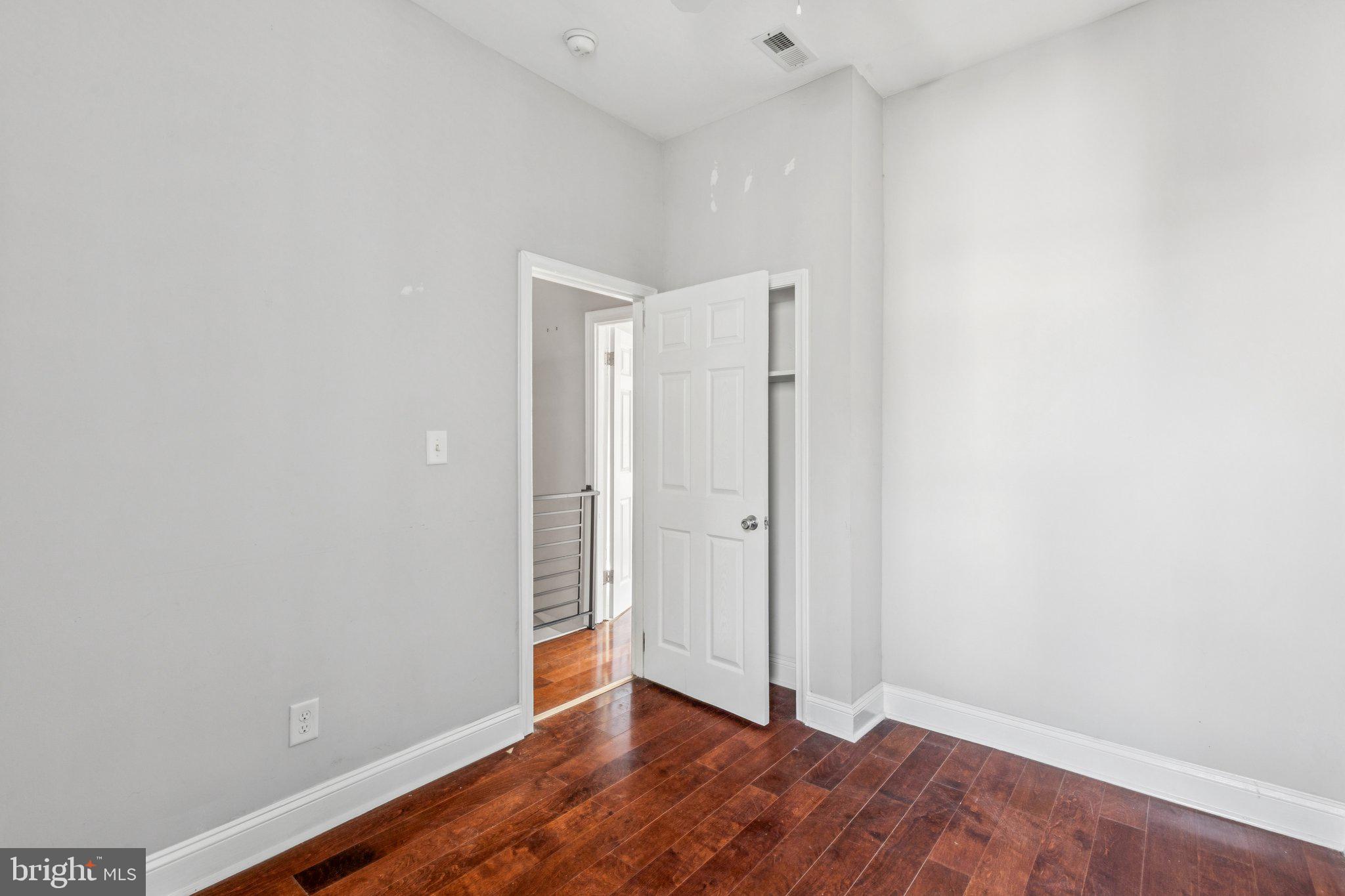 1632 North Dover Street Philadelphia, PA 19121 - Photo 8 of 23 a view of an empty room with wooden floor