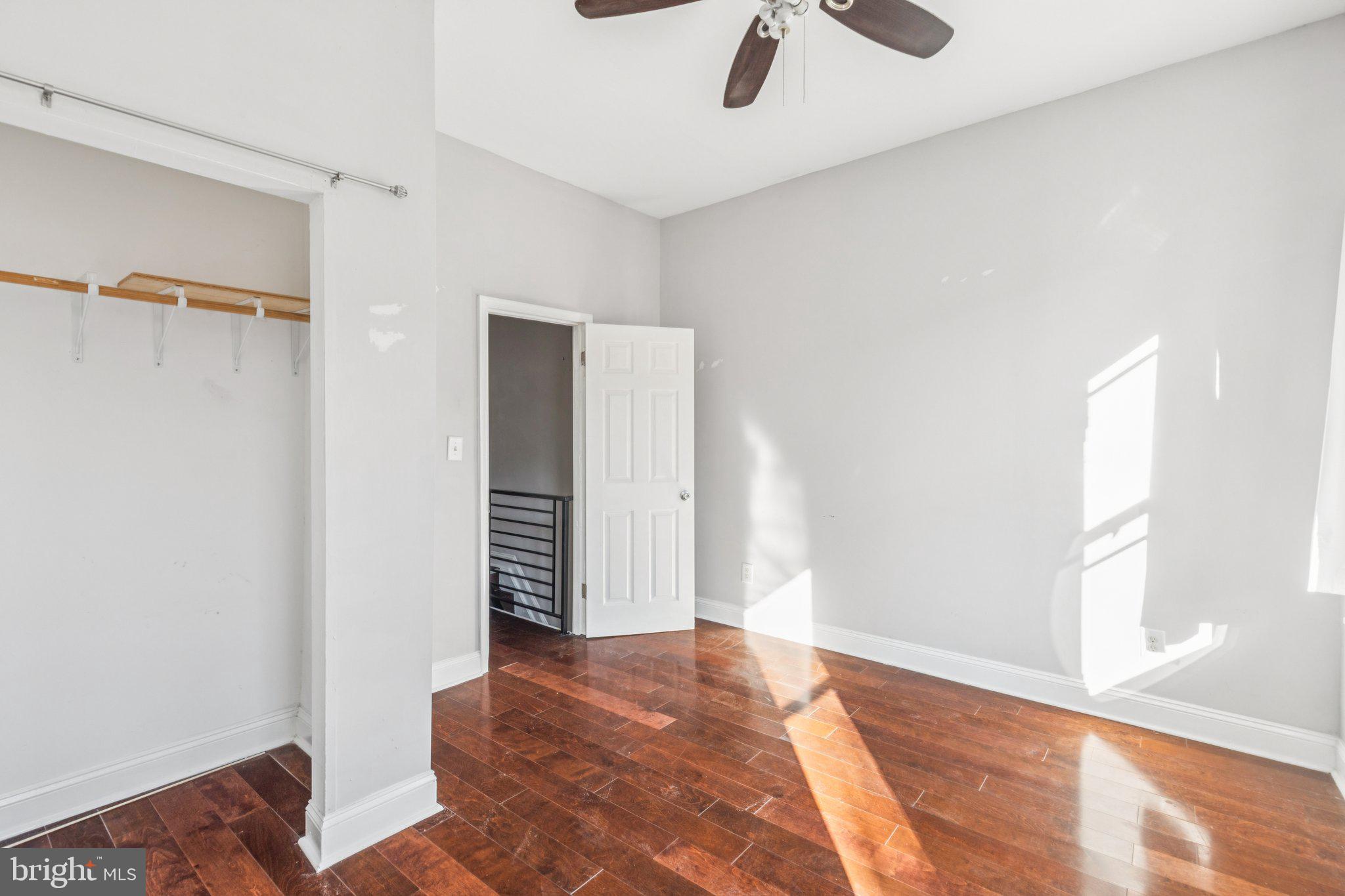 1632 North Dover Street Philadelphia, PA 19121 - Photo 9 of 23 a view of a room with a ceiling fan and wooden floor