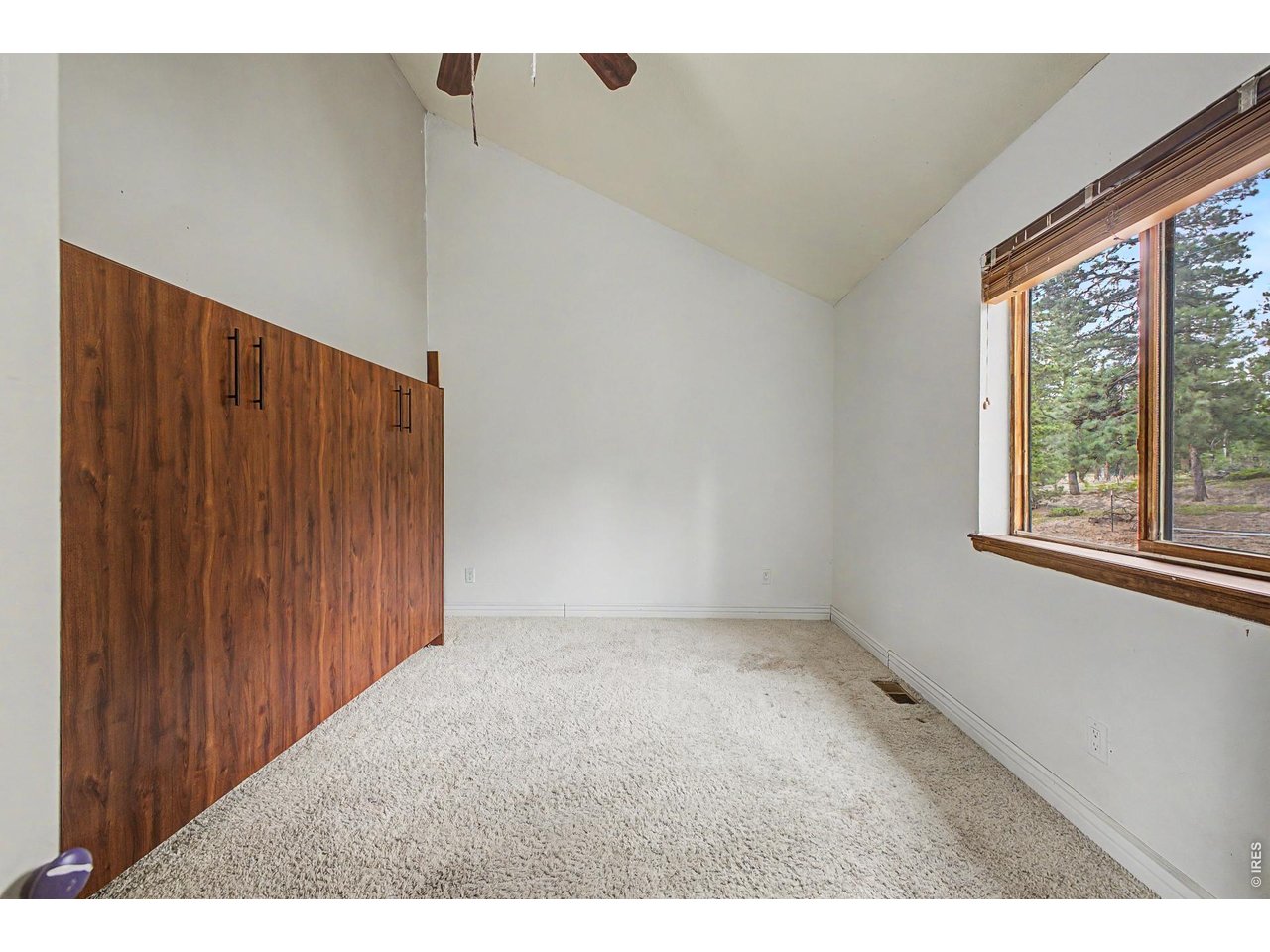 76 Highlands Drive Bailey, CO 80421 - Photo 32 of 49 a view of an empty room with a window