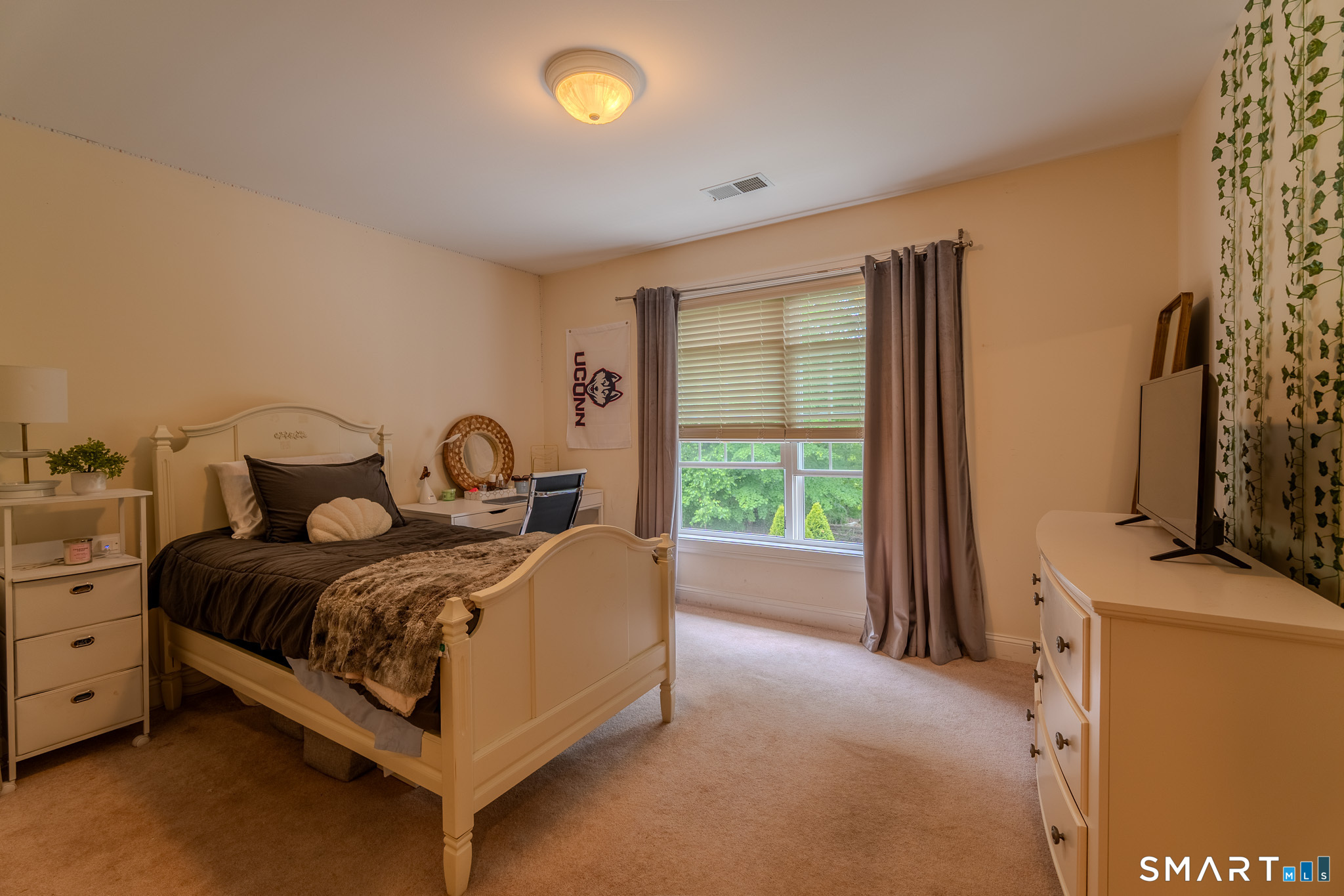 4 Ortense Road Wallingford, CT 06492 - Photo 24 of 33 a bed room with a bed and a window