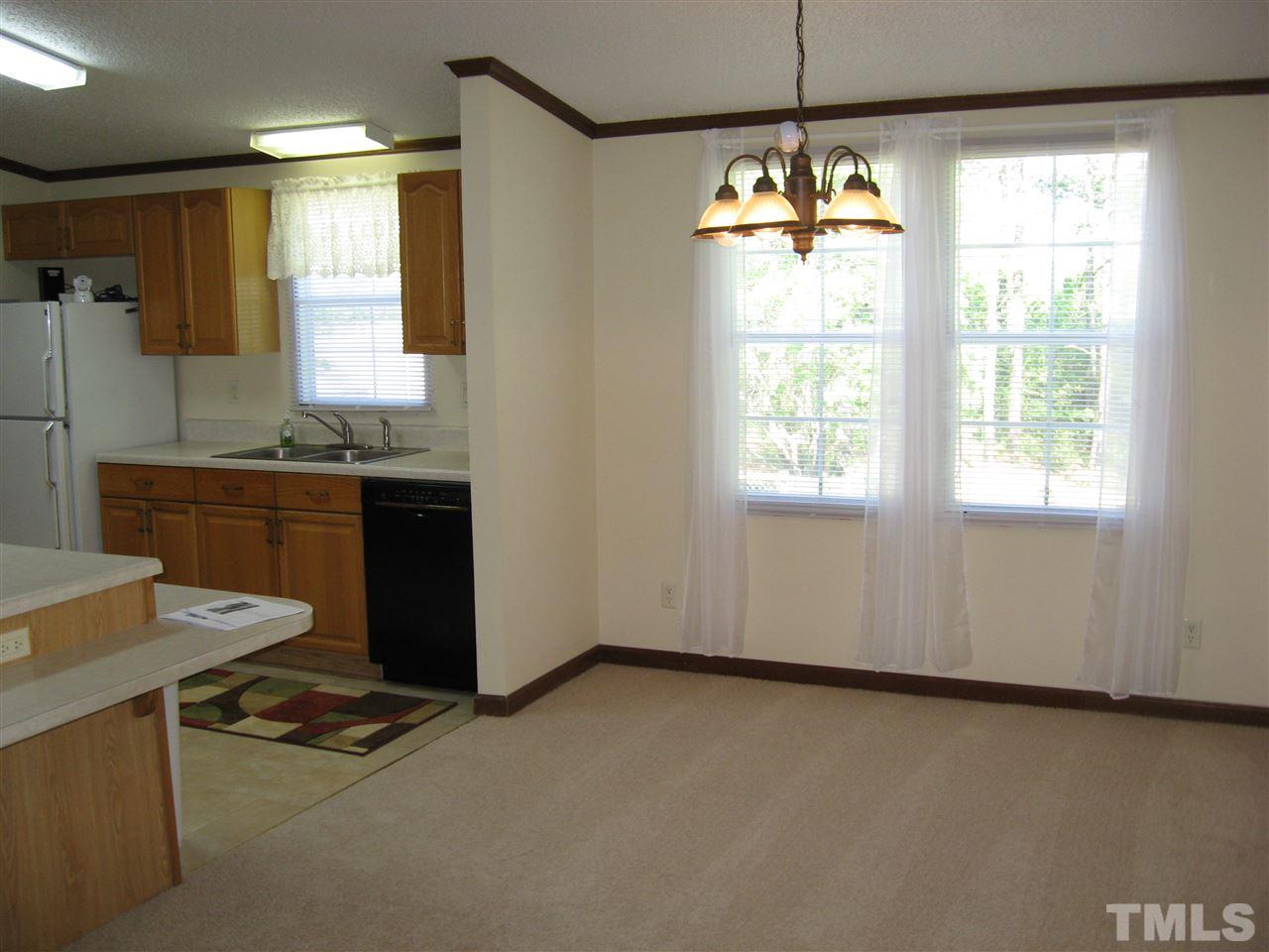 1445 L L Cooper Road Cameron, NC 28326 - Photo 4 of 25 a kitchen with sink and window