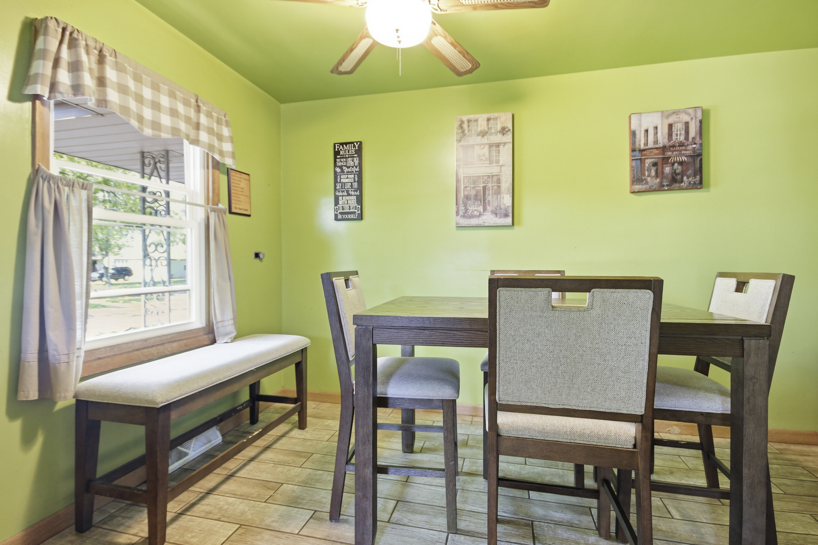 18655 Sherman Street Lansing, IL 60438 - Photo 9 of 21 a view of a dining room with furniture window and outside view