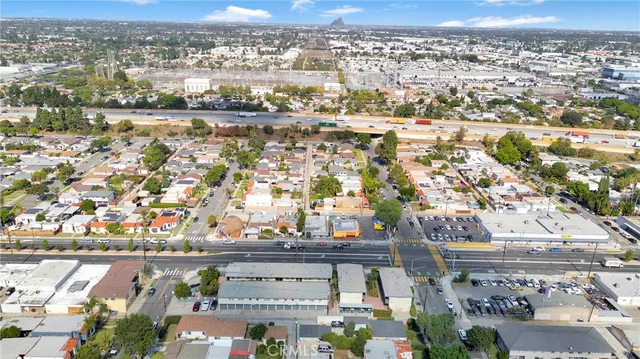 an aerial view of residential building and lake