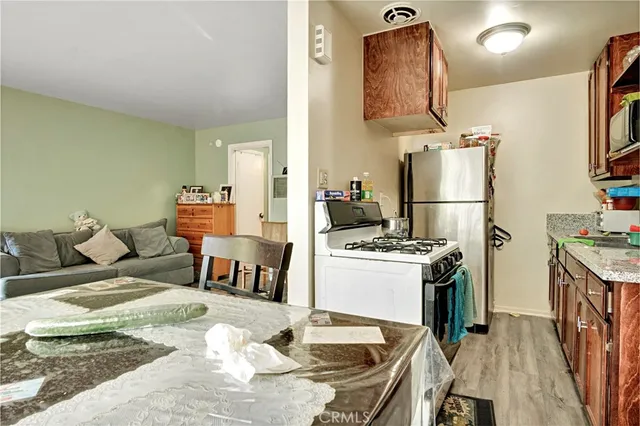 a living room with furniture and a table