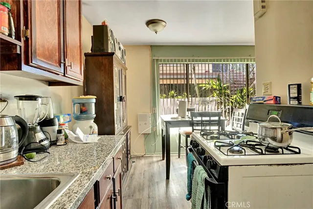 a kitchen with a stove and a sink