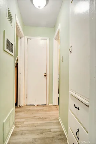 a view of a bathroom with a tub and shower