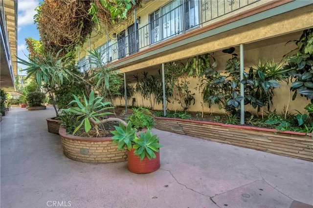 a view of a chair and table in the balcony