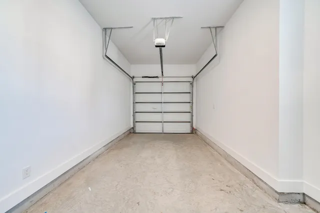 a view of empty room with stairs