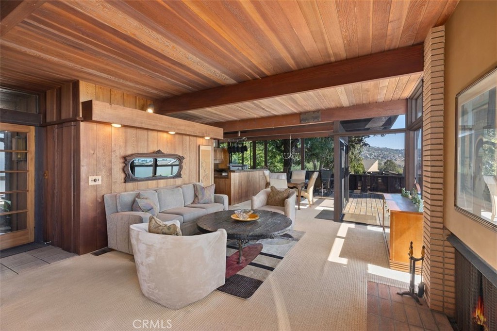 394 Pinecrest Drive Laguna Beach, CA 92651 - Photo 13 of 41 a living room with furniture and a large window