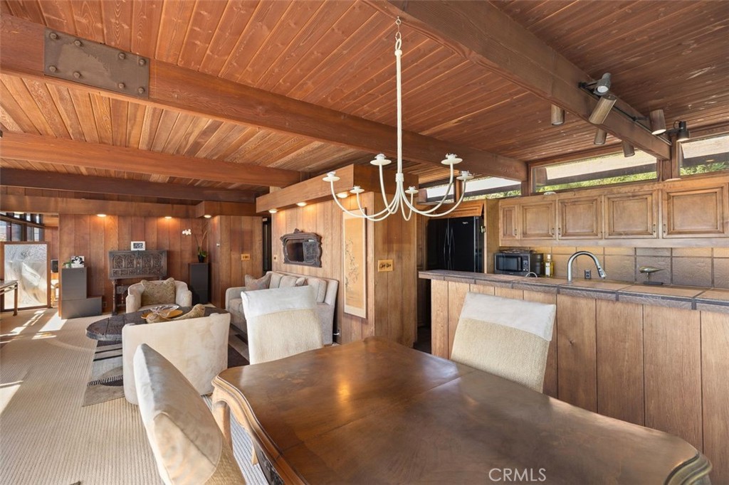 394 Pinecrest Drive Laguna Beach, CA 92651 - Photo 16 of 41 a view of a kitchen with furniture and refrigerator