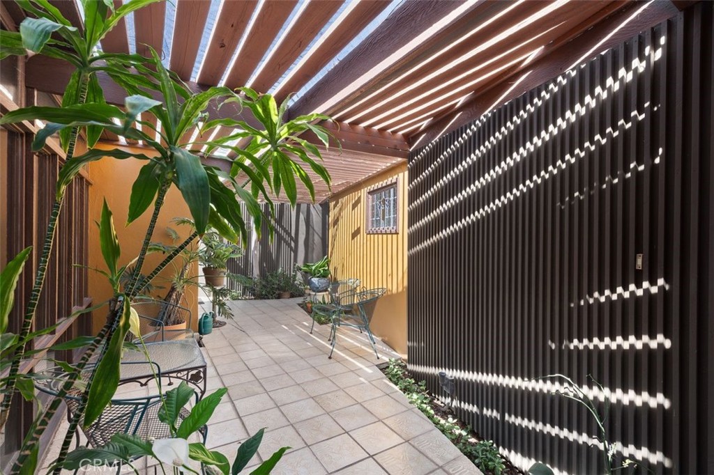 394 Pinecrest Drive Laguna Beach, CA 92651 - Photo 29 of 41 a path view of a house with a garden