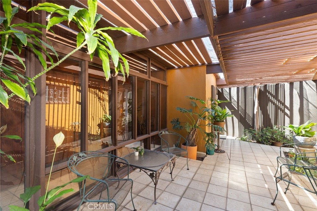 394 Pinecrest Drive Laguna Beach, CA 92651 - Photo 31 of 41 a view of an entryway with wooden floor