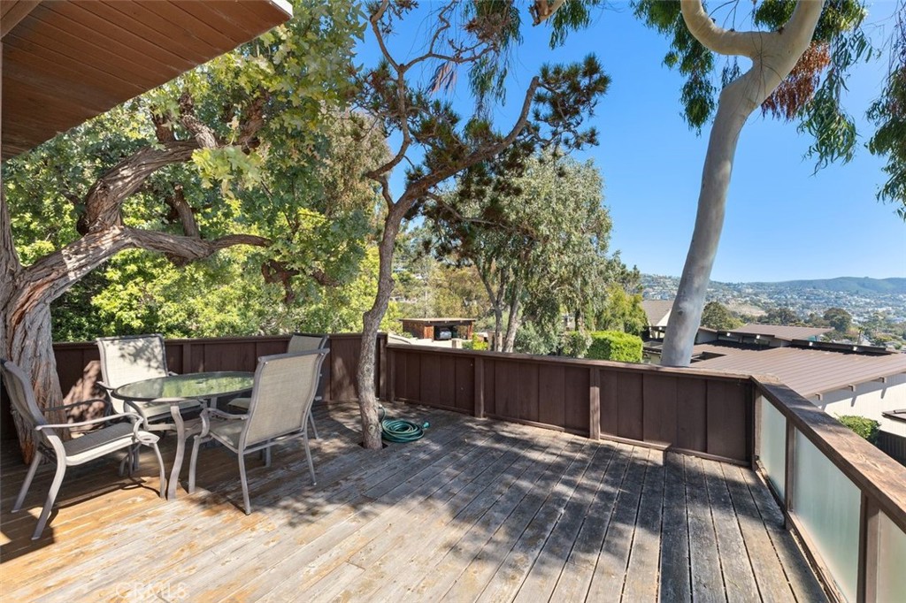394 Pinecrest Drive Laguna Beach, CA 92651 - Photo 33 of 41 a view of a backyard with furniture and tree