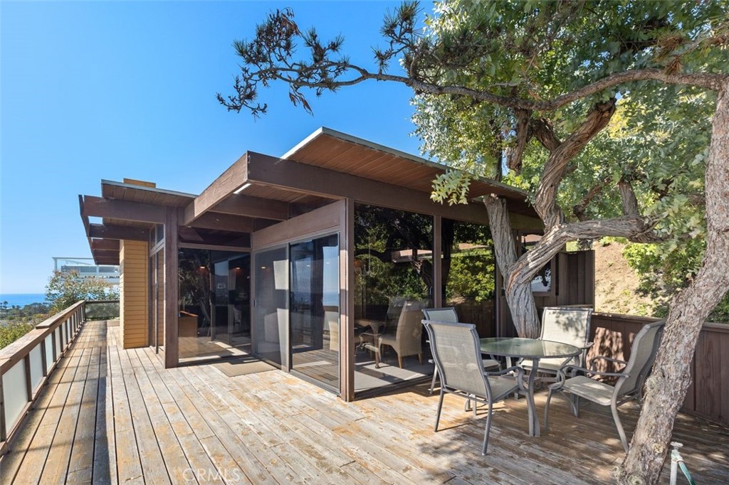 394 Pinecrest Drive Laguna Beach, CA 92651 - Photo 34 of 41 a patio with table and chairs