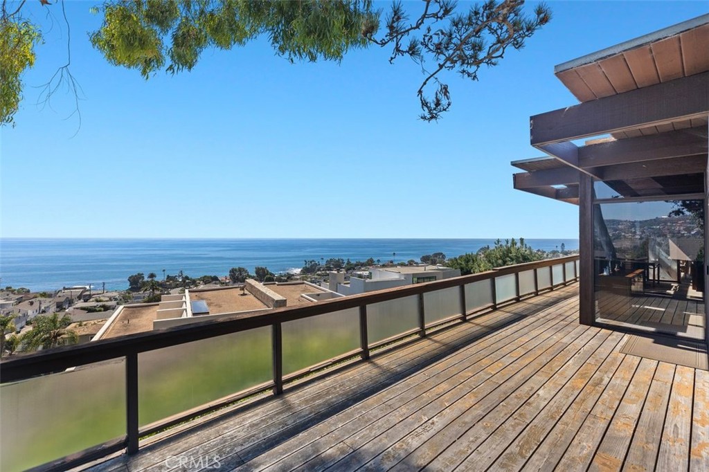 394 Pinecrest Drive Laguna Beach, CA 92651 - Photo 5 of 41 a view of a balcony with wooden floor and outdoor space