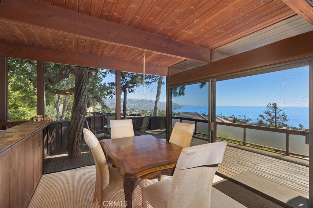 394 Pinecrest Drive Laguna Beach, CA 92651 - Photo 8 of 41 a view of an outdoor dining space with furniture