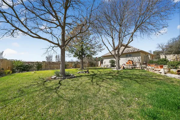 a view of a yard in front of a house