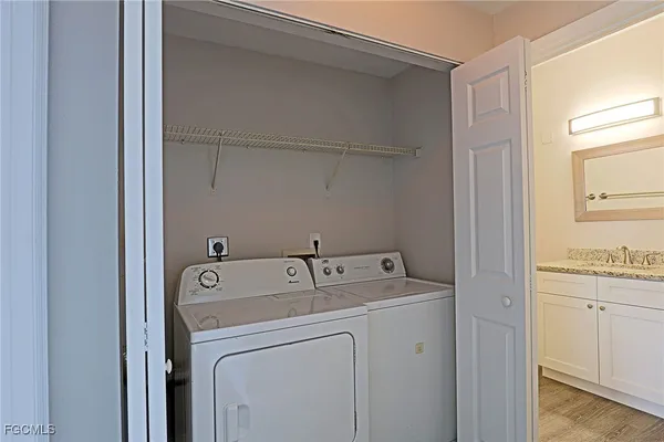 a utility room with dryer and washer