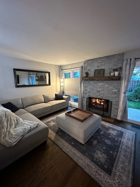 1929 Stillwater Road Arlington Heights, IL 60004 - Photo 12 of 29 a living room with furniture and a fireplace
