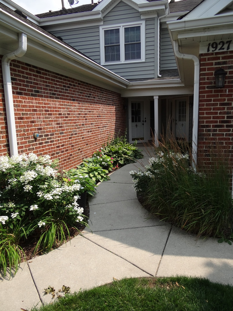 1929 Stillwater Road Arlington Heights, IL 60004 - Photo 2 of 29 a view of a house with potted plants