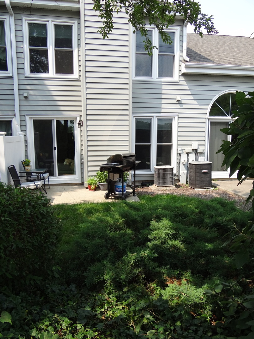 1929 Stillwater Road Arlington Heights, IL 60004 - Photo 21 of 29 a view of a house with backyard and sitting area