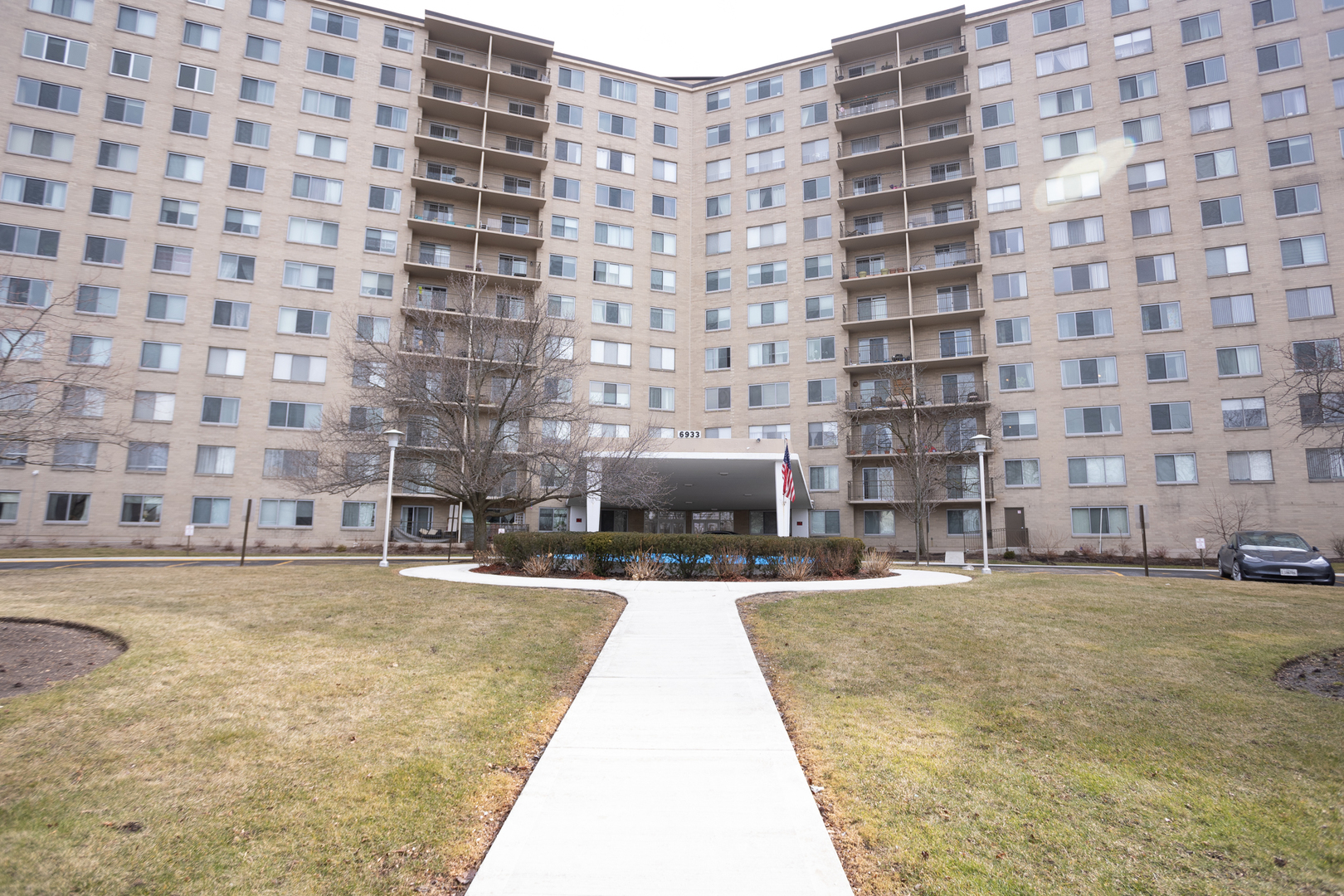 Undisclosed Address Chicago, IL 60645 - Photo 1 of 20 a building with swimming pool in front of it