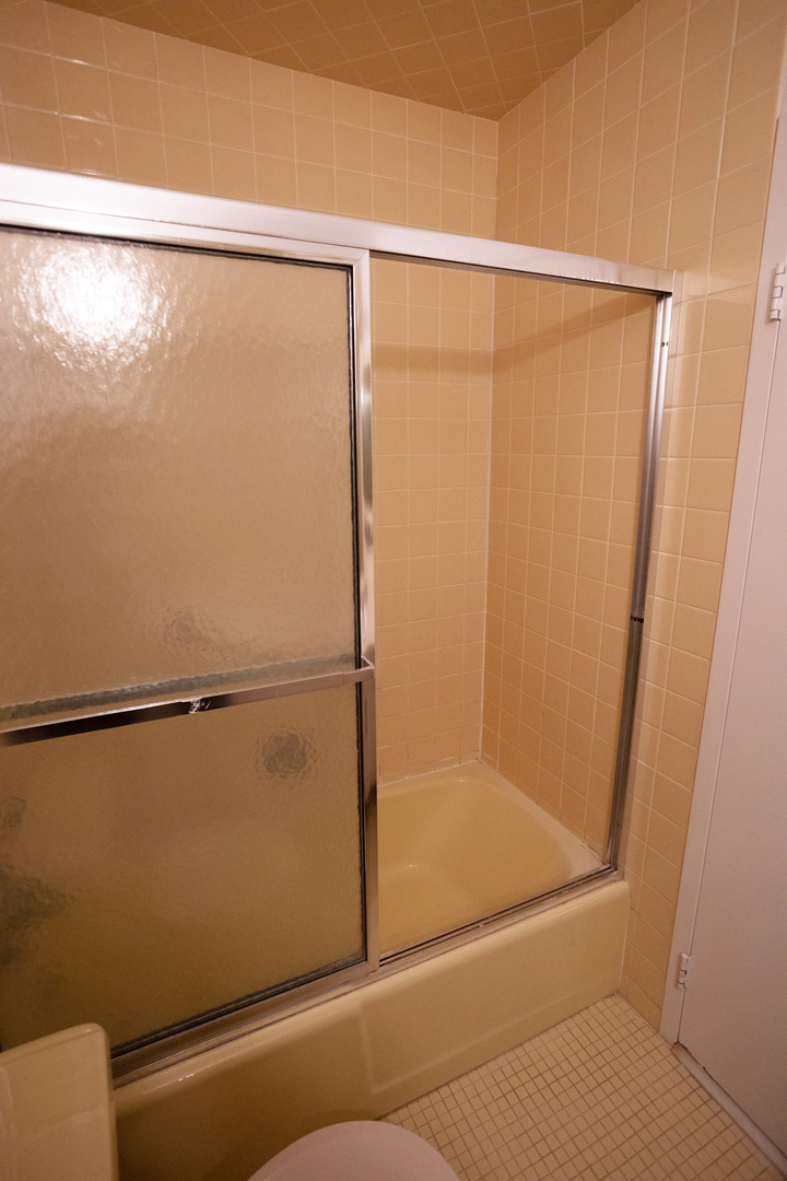 Undisclosed Address Chicago, IL 60645 - Photo 14 of 20 a bathroom with a shower